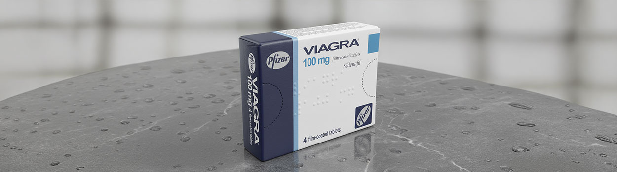 Viagra 100 mg Pfizer doboz 4 filmtablettás kiszerelésben szürke felületen vízcseppekkel